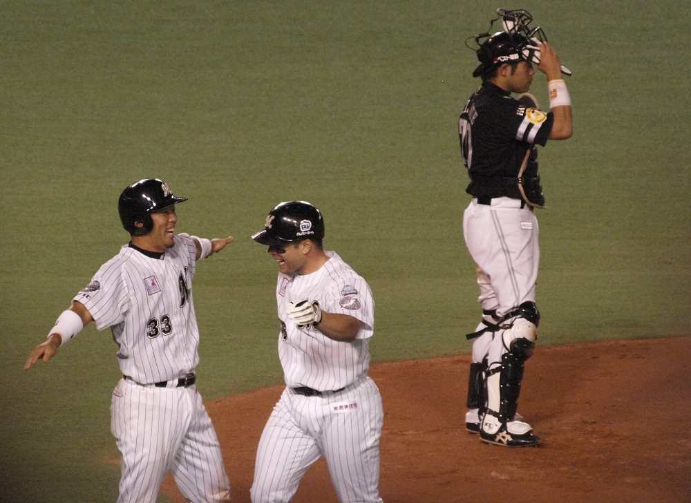 Hashimoto and Burnham Jr celebrate at the plate