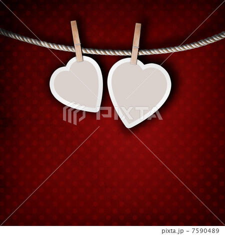 Paper hearts hanging on a rope on grunge background 7590489