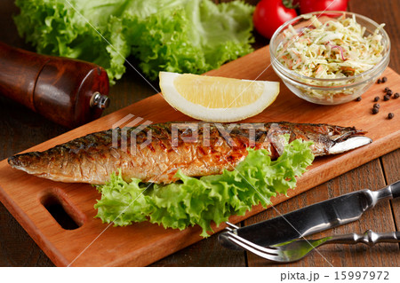 Fried mackerel with slice of lemon and lettuce 15997972