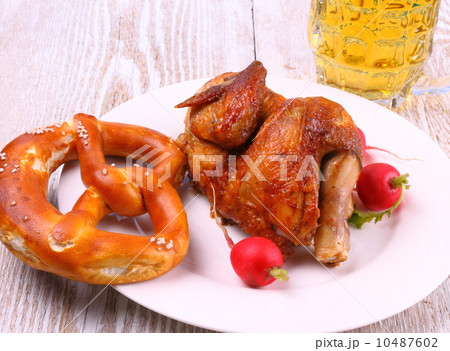 Oktoberfest chicken with pretzel, beer and radish 10487602