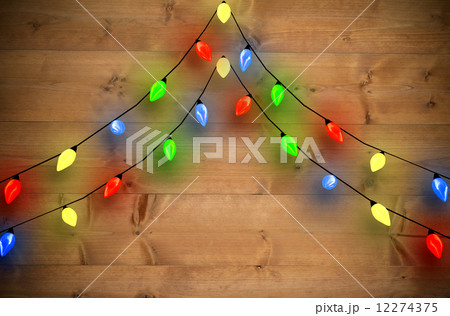 Composite image of decorative lights hanging in a shape 12274375