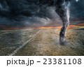 Tornado funnel over field during thunderstorm 23381108