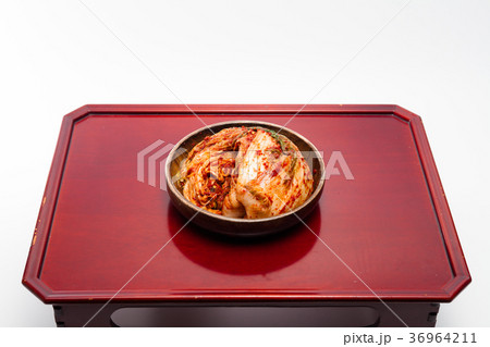 Kimchi in wooden bowl on wood desk 36964211