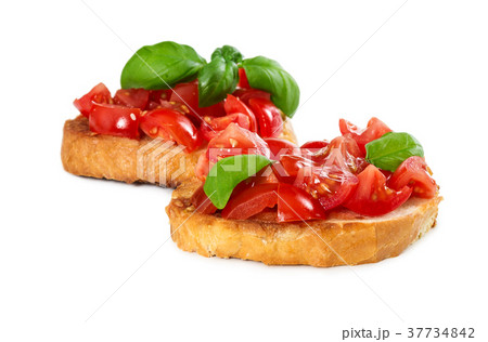 Two bruschetta with fresh tomato and basil 37734842