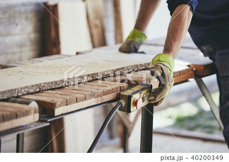 Man working in sawmill 40200349