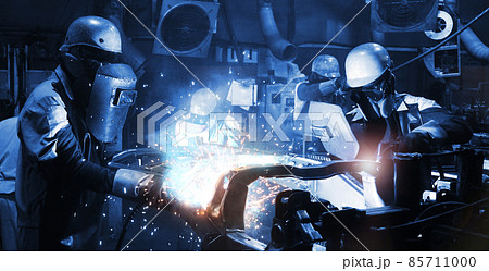 welder Industrial automotive part in factory, worker with protective mask welding metal (welding, welder, steel) 85711000