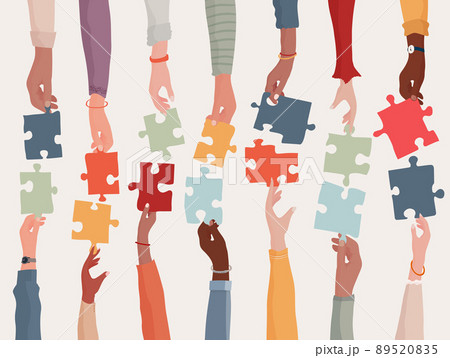 Agreement or affair between a group of colleagues or collaborators. Diversity people co-workers who collaborate. Arms and hands holding a jigsaw puzzle piece.Concept of sharing.Community 89520835