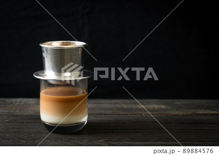 Hot milk coffee dripping in Vietnam style 89884576