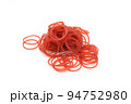 Red rubber band isolated on white background. 94752980