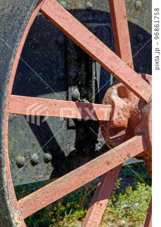 Detail of steam locomotives old rusty wheel - Chiloe Island, Chile 96861758