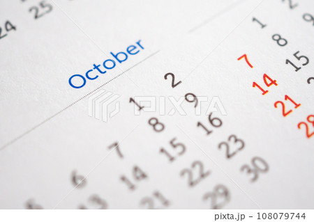 October calendar page with months and dates business planning appointment meeting concept 108079744