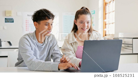 Learning, teamwork and high five of students on laptop in classroom, achievement and goal. Education, computer and teenager in celebration of success, happy kids and study knowledge at high school 108525231