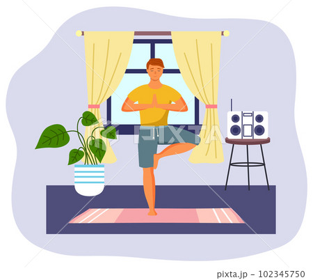 Man doing yoga at home. Young happy man standing in a tree pose in living room, healthy lifestyle 102345750