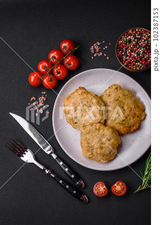 Delicious fried chopped fillet pancakes with spices, salt and herbs 102387153