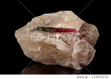 Macro stone tourmaline mineral on a black background  114432258