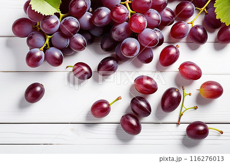 Red grapes on wooden table, Red grapes with sunlight, sweet Red grapes on wood background. 116276013