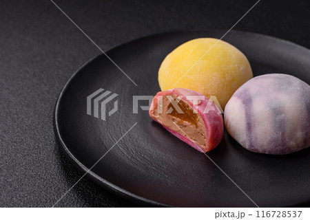 Delicious sweet chilled mochi desserts with fruit filling 116728537