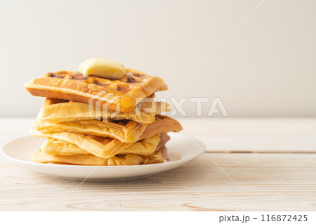 waffle stack with butter and honey 116872425