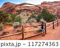 Landscape Arch with Young Tourist Boy, Utah 117274363