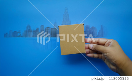 Mockup empty blank kraft cardboard Close-up hand holding card board. AI Generated. 118005536