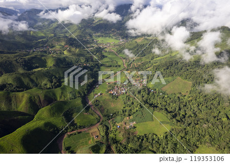 Landscape of Morning Mist with Mountain Layer. mountain ridge and clouds in rural jungle bush forest 119353106