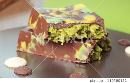 Dubai chocolate bar with pistachio paste and kataifi dough. Confectionery and sweets. 119560121