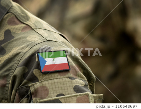 Flag of Equatorial Guinea on military uniform. Army, troops, soldiers, Equatorial Guinea (collage). 110648697