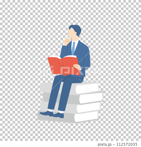 Businessman sitting on a book and reading 112572035