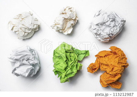 Colorful crumpled paper balls isolated on white background. 113212987