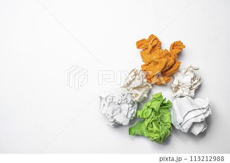 Colorful crumpled paper balls isolated on white background. 113212988