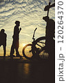 Skateboarding and BMX bike Silhouette Extreme Skatepark Images Orange Sunlight Youth Culture Enjoy Sports Vacation Skateboard 120264370