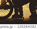 Skateboarding and BMX bike Silhouette Extreme Skatepark Images Orange Sunlight Youth Culture Enjoy Sports Vacation Skateboard 120264382