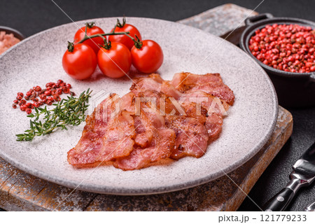 Delicious crispy bacon grilled with salt and spices 121779233