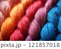 Threads sewing cotton knitting tailors colored background in a row for needlework woolen. 121857018