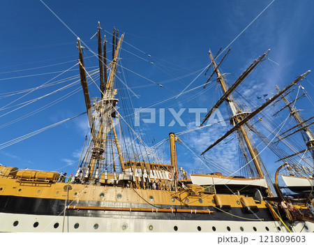 A large old ship at pier under a beautiful blue sky 121809603