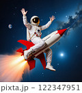 Astronaut riding a rocket 122347951