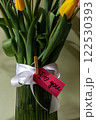 I LOVE YOU paper card Bouquet of colorful tulips in vase in pastel green background. Copy space for greeting card. Holiday flowers springtime  122530393