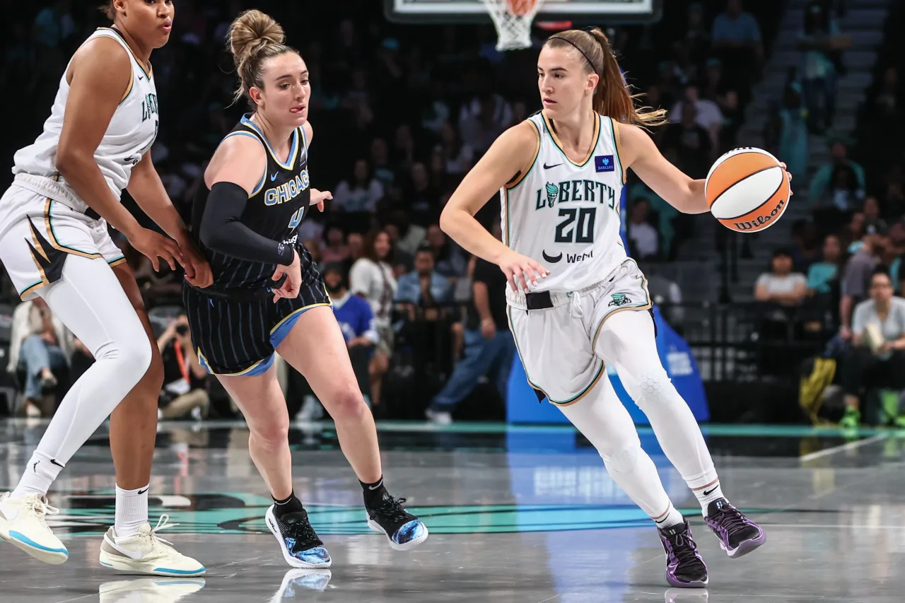 New York Liberty guard Sabrina Ionescu (20) looks to drive past Chicago Sky guard Marina Mabrey (4) in the first quarter at Barclays Center.