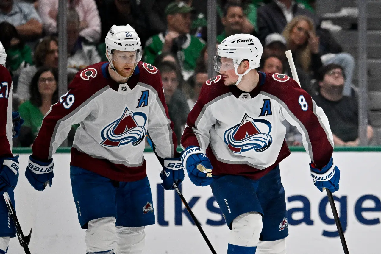 Colorado Avalanche center Nathan MacKinnon (29) and defenseman Cale Makar (8) skate off the ice after Makar scores a power play goal against the Dallas Stars during the second period in game five of the second round of the 2024 Stanley Cup Playoffs at American Airlines Center.