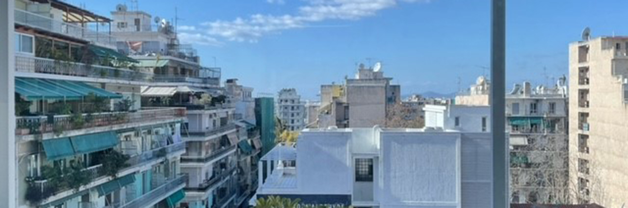 Balcony view of Greece landscape with housing.