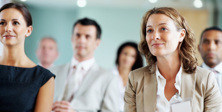 Attendees listen intently during tax seminar