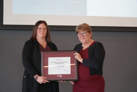 Heather and Samatha with the Veronika Czerneda Staff Award for Outstanding Service