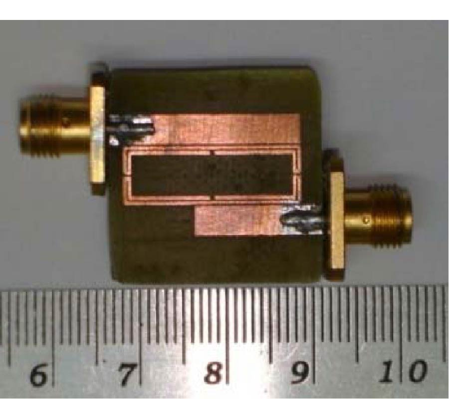 COMPACT BANDPASS FILTER USING FOLDED LOOP RESONATOR WITH HARMONIC SUPPRESSION