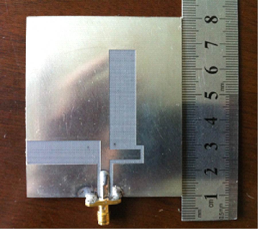 DESIGN OF CPW-FED CIRCULARLY POLARIZED ANTENNA WITH TWO ORTHOGONAL SLOTS