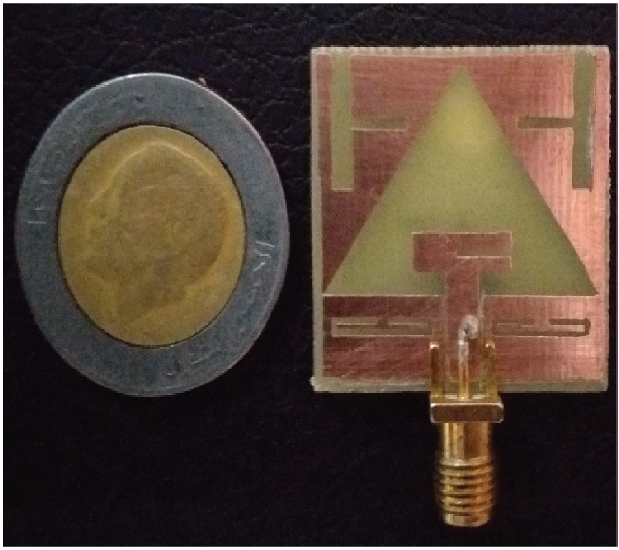 CPW-FED MINIATURIZED ISOSCELES TRIANGULAR SLOT UWB PLANAR ANTENNA WITH TRIPLE BAND-NOTCHED CHARACTERISTICS