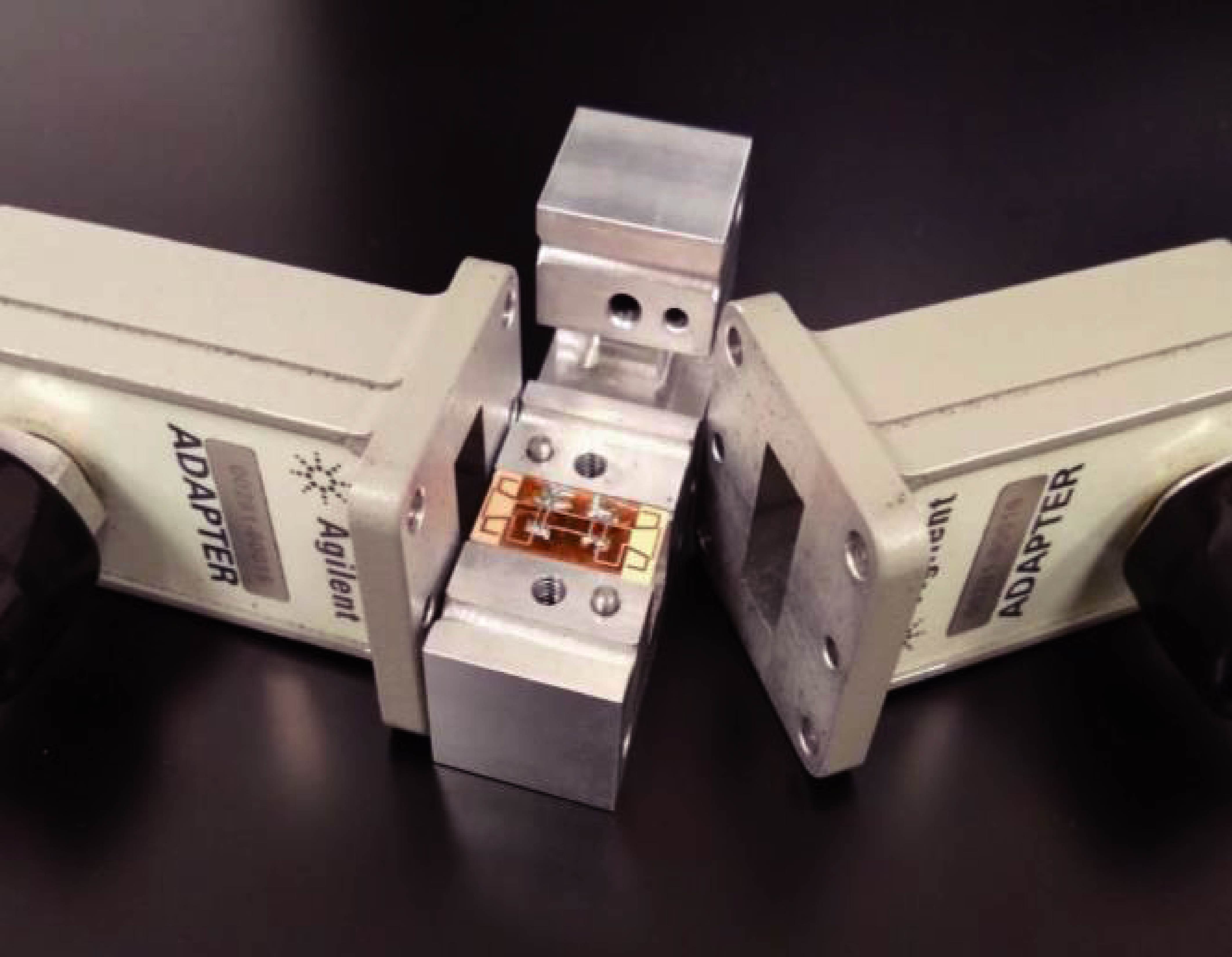 Compact and Broadband CPW-to-RWG Transition Using Resonator with Impedance-matching Element