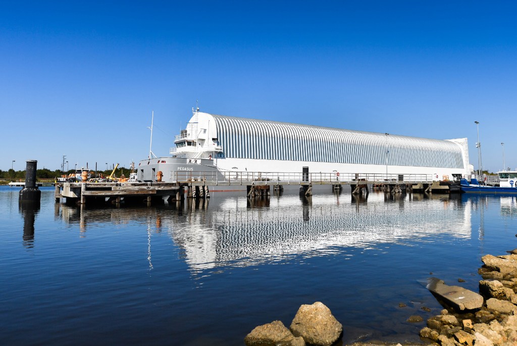 Barge Pegasus docked in harbor at NASA’s Michoud Assembly Facility in New Orleans.