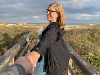 Jessica holding my hand as she runs to the beach. Sounds magical; looks dorky.