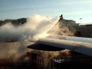 de-icing the airplane wing