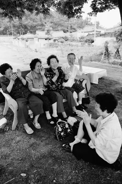 Older women singing together